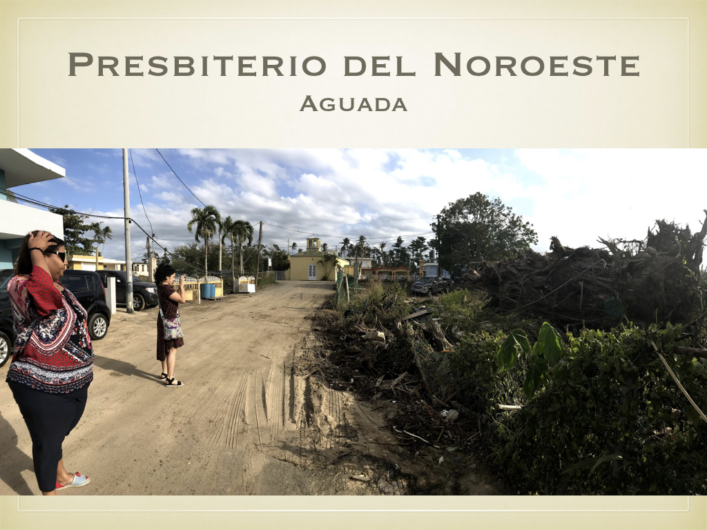 Standing about as far from the ocean as from the yellow building pictured here, one can begin to see how far the waves intruded inland. This paved road is covered by sand all the way to the yellow building, and perhaps beyond.