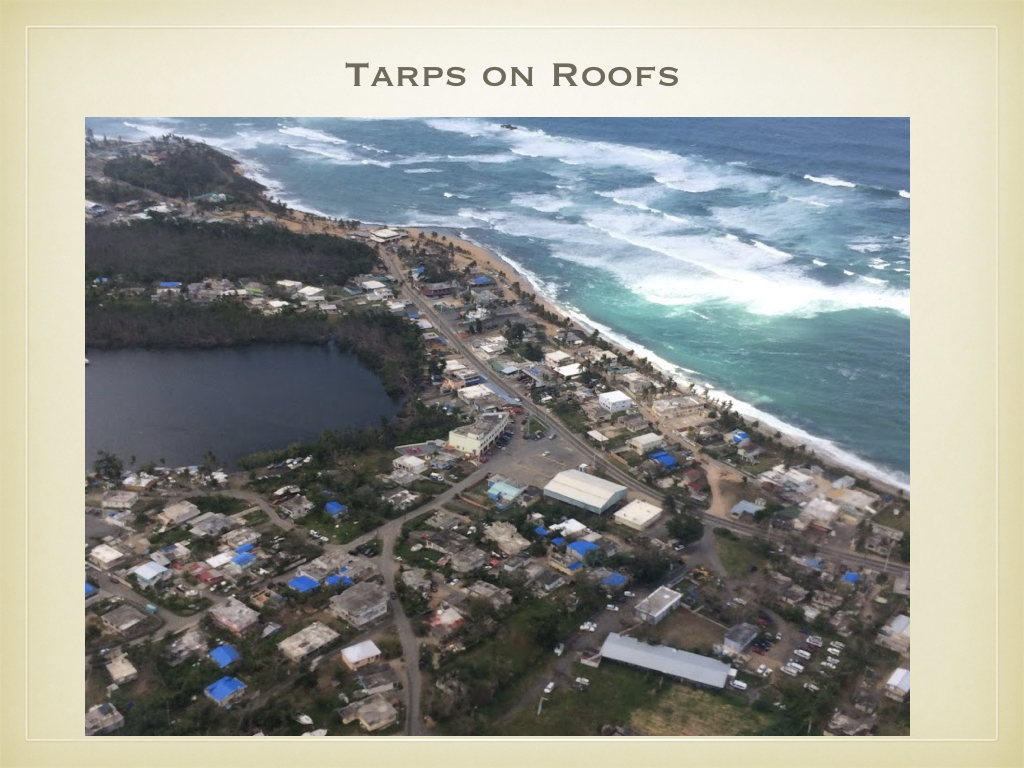 Throughout our visit, the prevalence of blue tarp-covered roofs was remarkable. The neighborhood pictured here is only a very modest example. The percentage in other neighborhoods is much larger.
