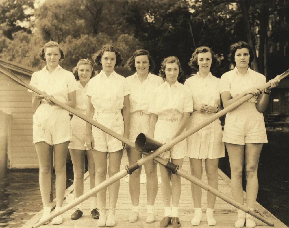 Dorris Forsbey Sturges (third from right, with megaphone) stands with her Knox School crew in 1938.
