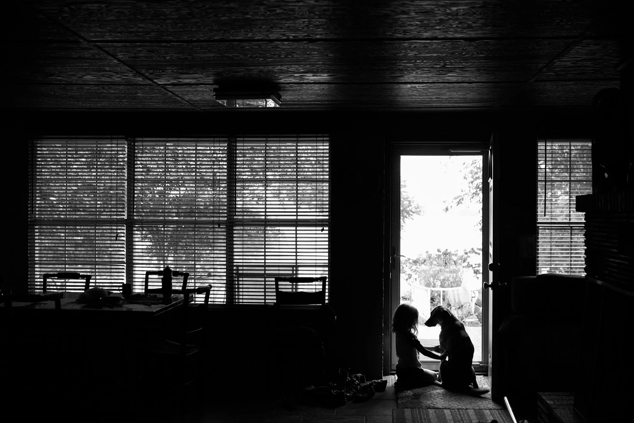 August 17: It seems like I've taken this photo of Darby many times with many children in the cabin, but this one with Quinn is a favorite.