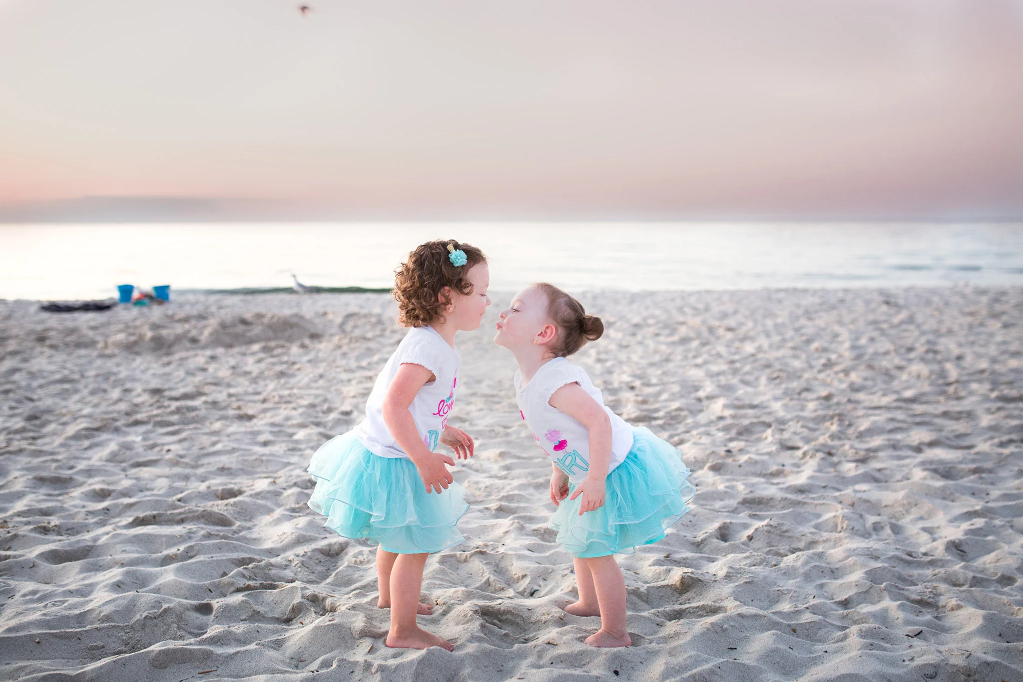 August 27: Six years ago in October I photographed their parents wedding. We met on the beach for some sunset pictures and then had ice cream, and now the girls are asking if they can play with me when they go to the park. This is my favorite part of my job: seeing families grow and change over time. 