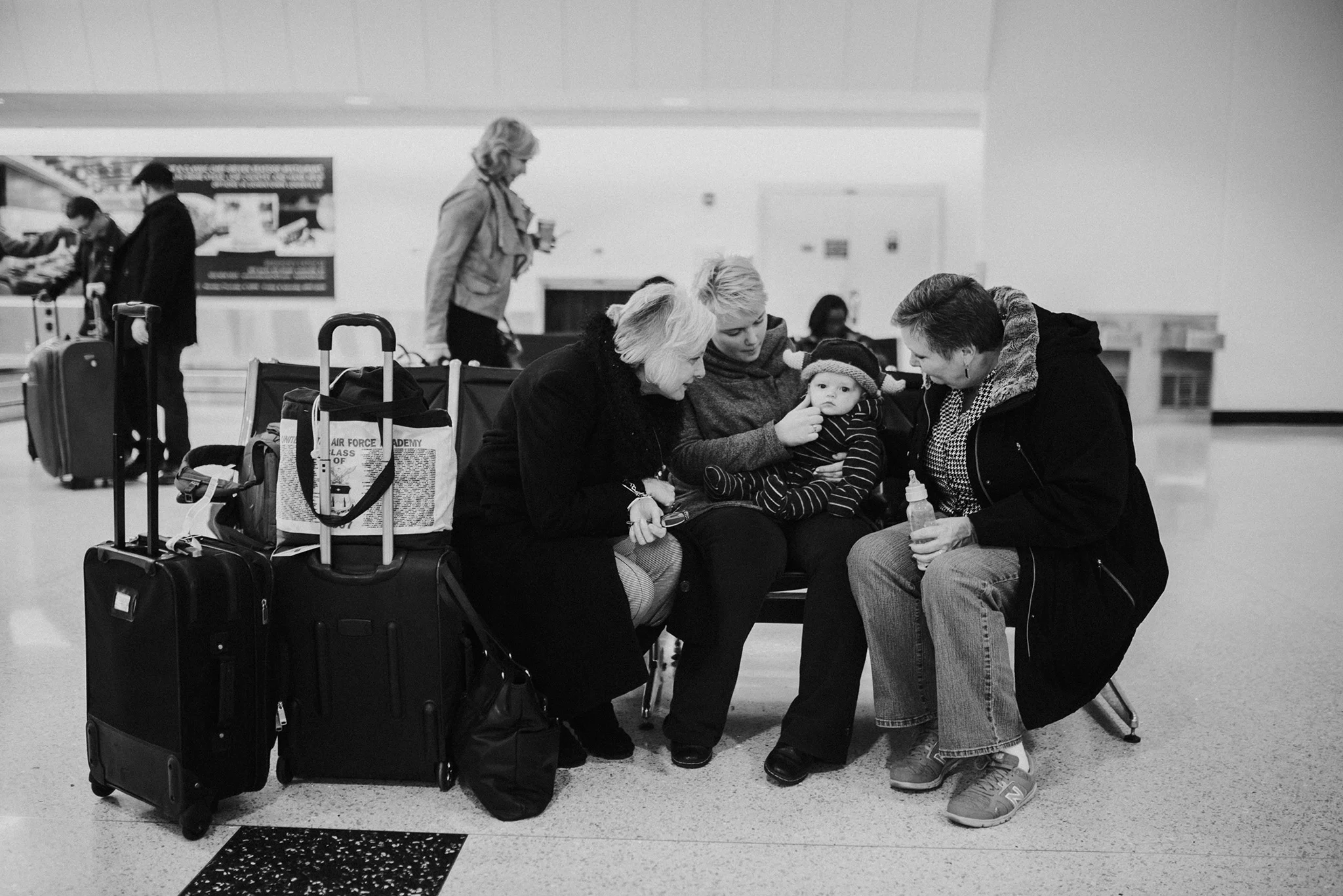 December 15: When we flew to Kentucky for my cousin Mary's wedding, my aunt and cousin met my mom, sister and her family at the airport, the best surprise. This photo was minutes after they met sweet Jameson.