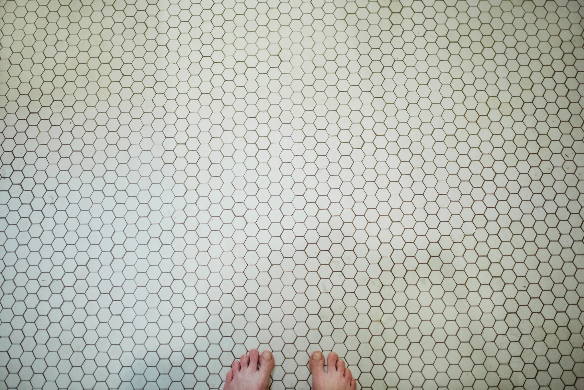 April 15: Honeycomb tiles in the upstairs bathroom.