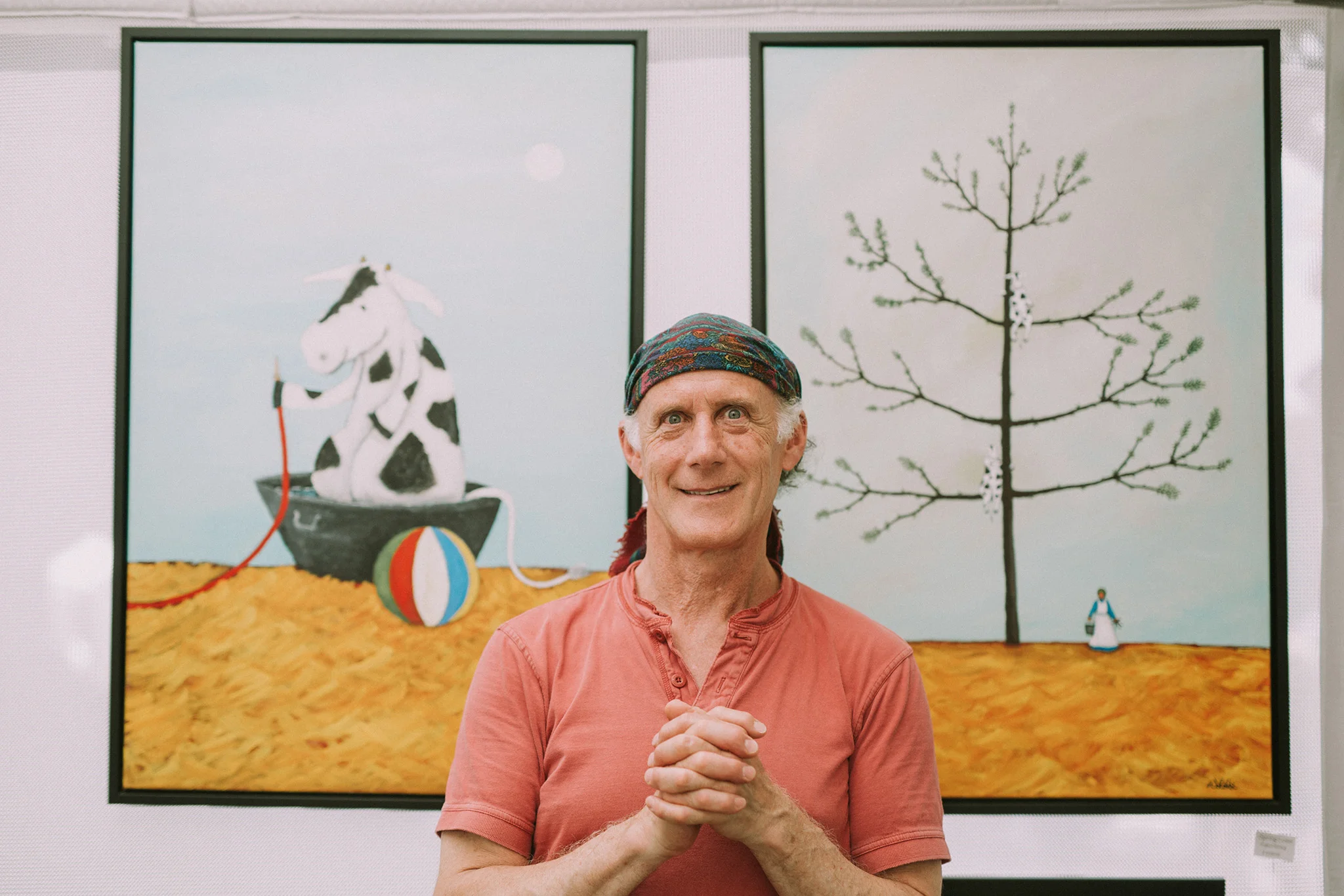 June 11: At the local art festival we bought a print from this guy, and he allowed me a photo. His personality exactly matched the one shot I took.