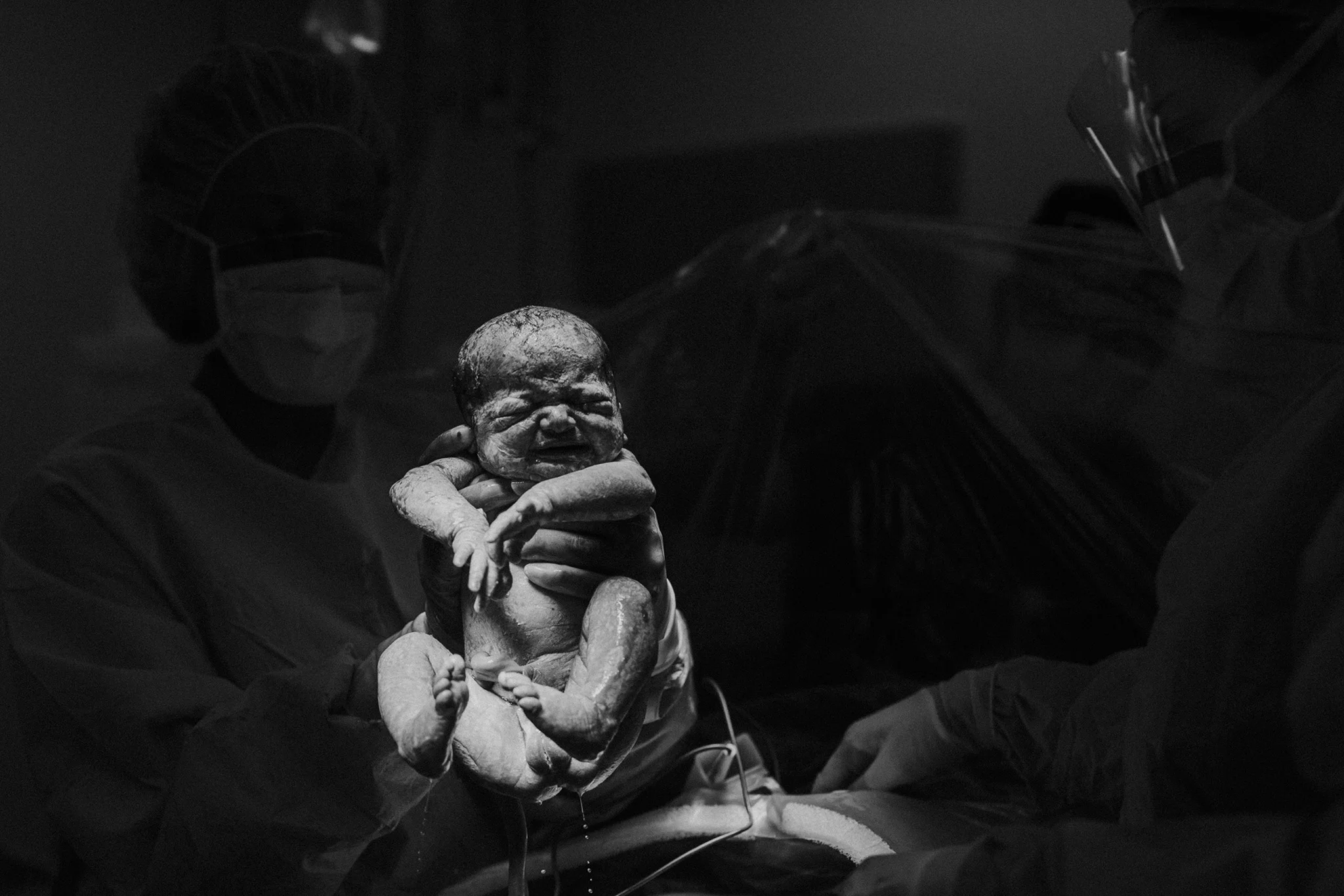 February 22: Margaret Joan's first impression of us was less enthusiastic than our first impression of her. Photographing any birth is incredible, but photographing my niece's birth... what a gift.