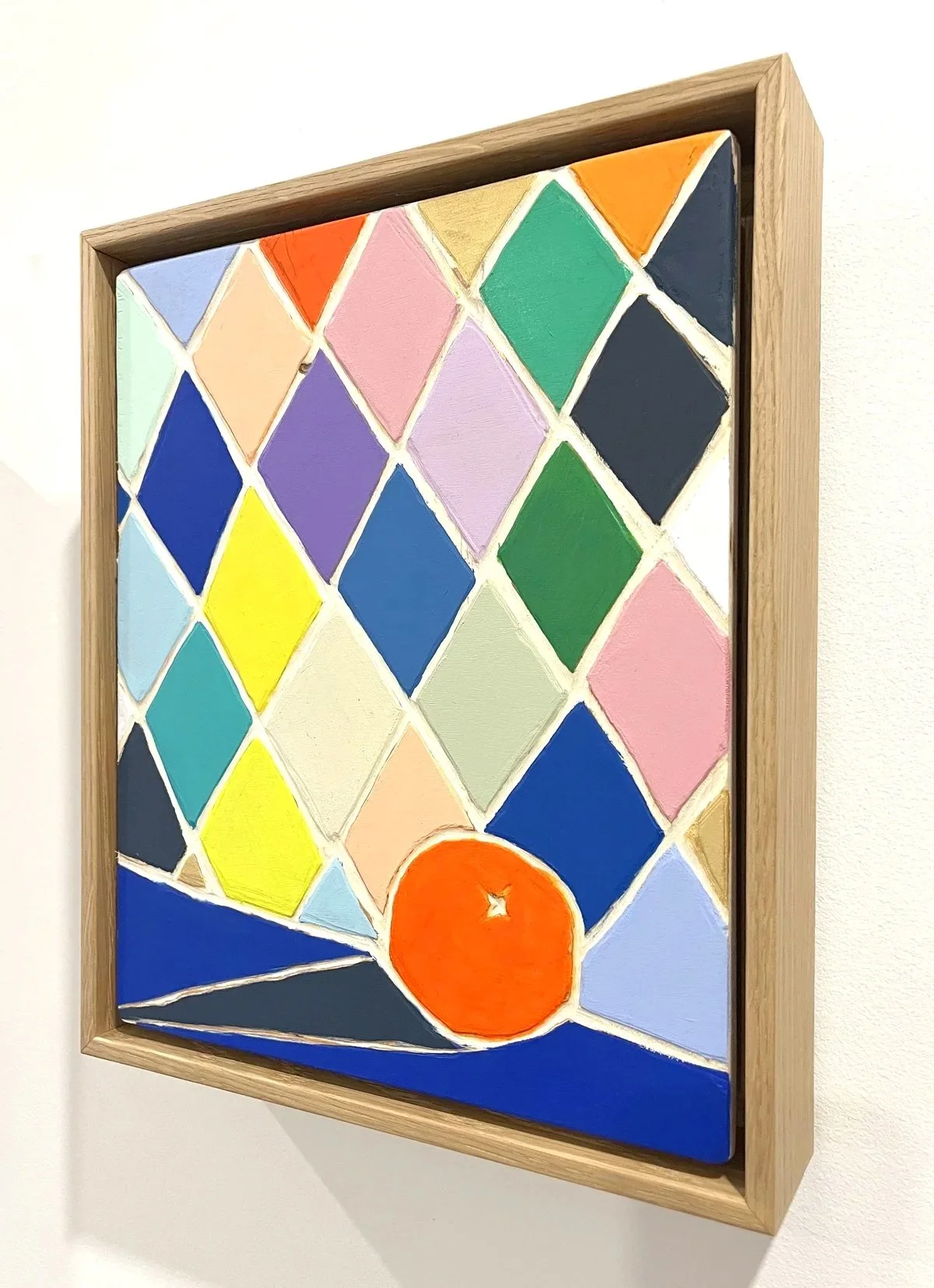   L’Orange , 2025 Acrylic on carved wood 12” x 10” x 2.25” 