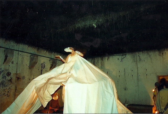 Buffy Miller (Bessie award winner) with Tarpiah performing underneath her. That's grass growing from the underground ceiling.