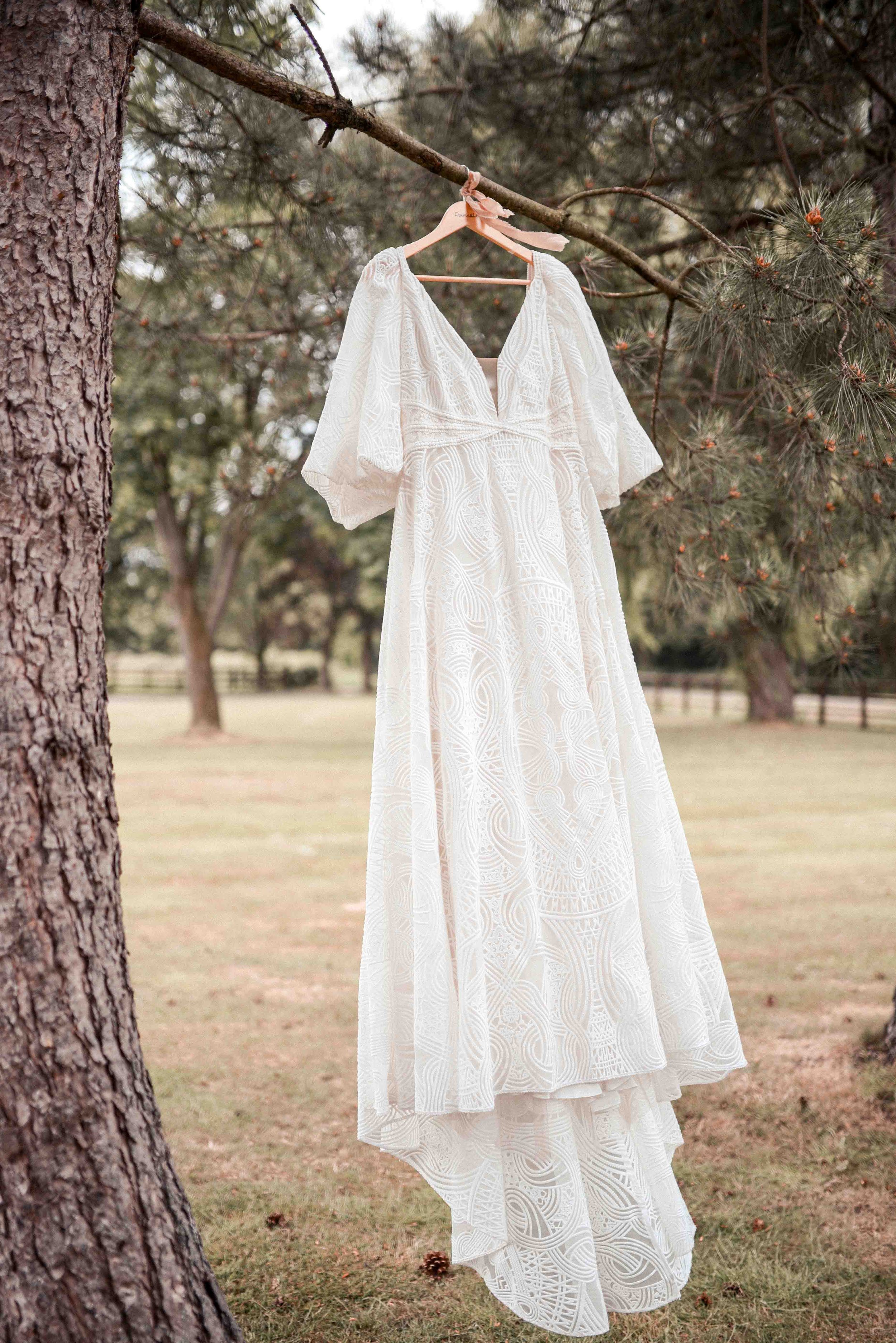 Vintage wedding dress on tree – artistic editorial photo at Villa Farm, York