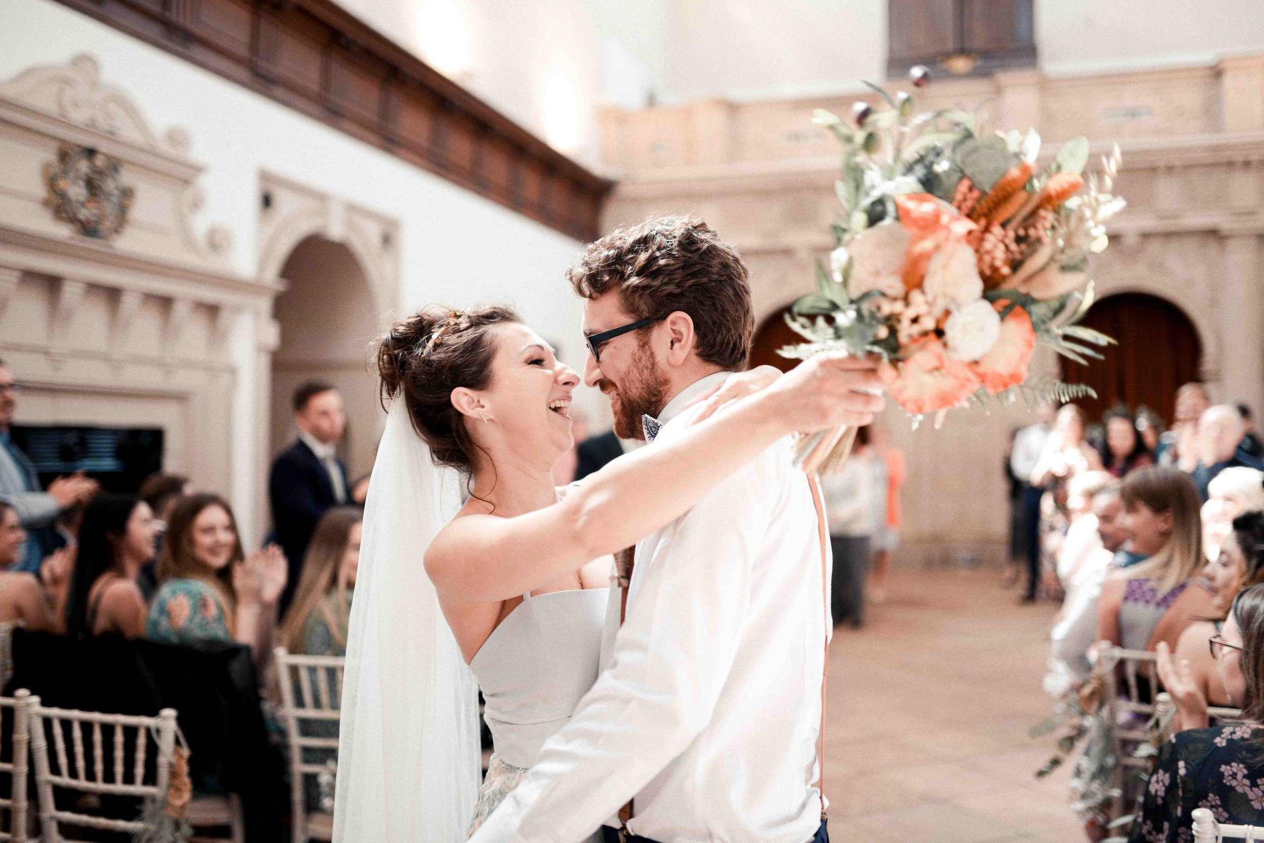 Post-ceremony kiss – Wollaton Hall wedding by Yorkshire photographer Ryan Lee Turton