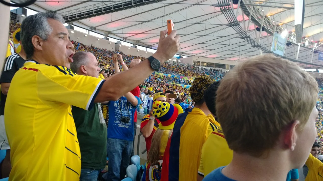 Pedro watches back Colombian James Rodriguez's wonder-goal on the big screen at the Fifa 2014 World Cup.