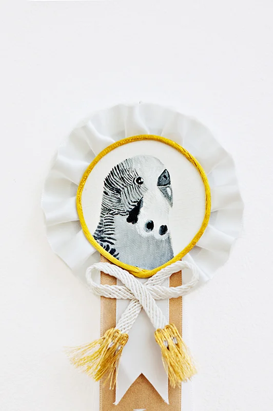 indifferent 2015 ribbon, oil on canvas, notions. 35cm x 7cm photograph courtesy millie brown