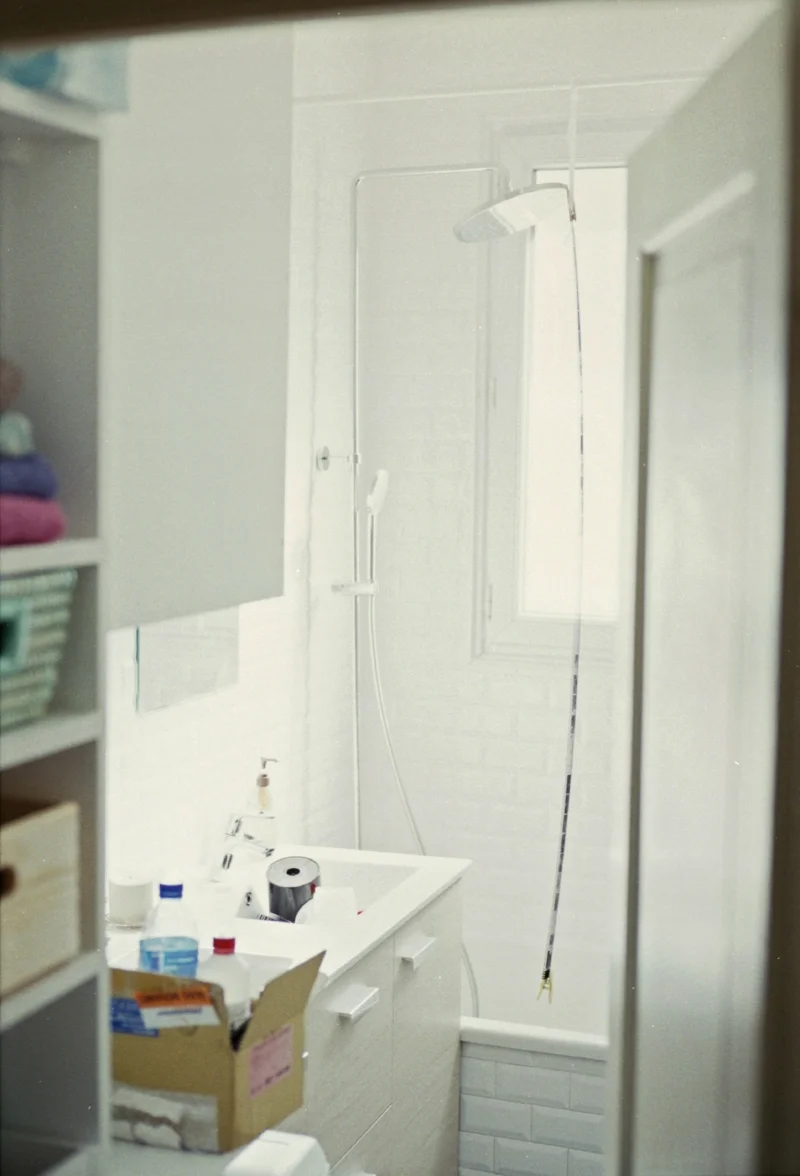 Neg Strip Taking a Shower This is not the end of the process. The scanner waits in the other room like a malevolent blue toad.