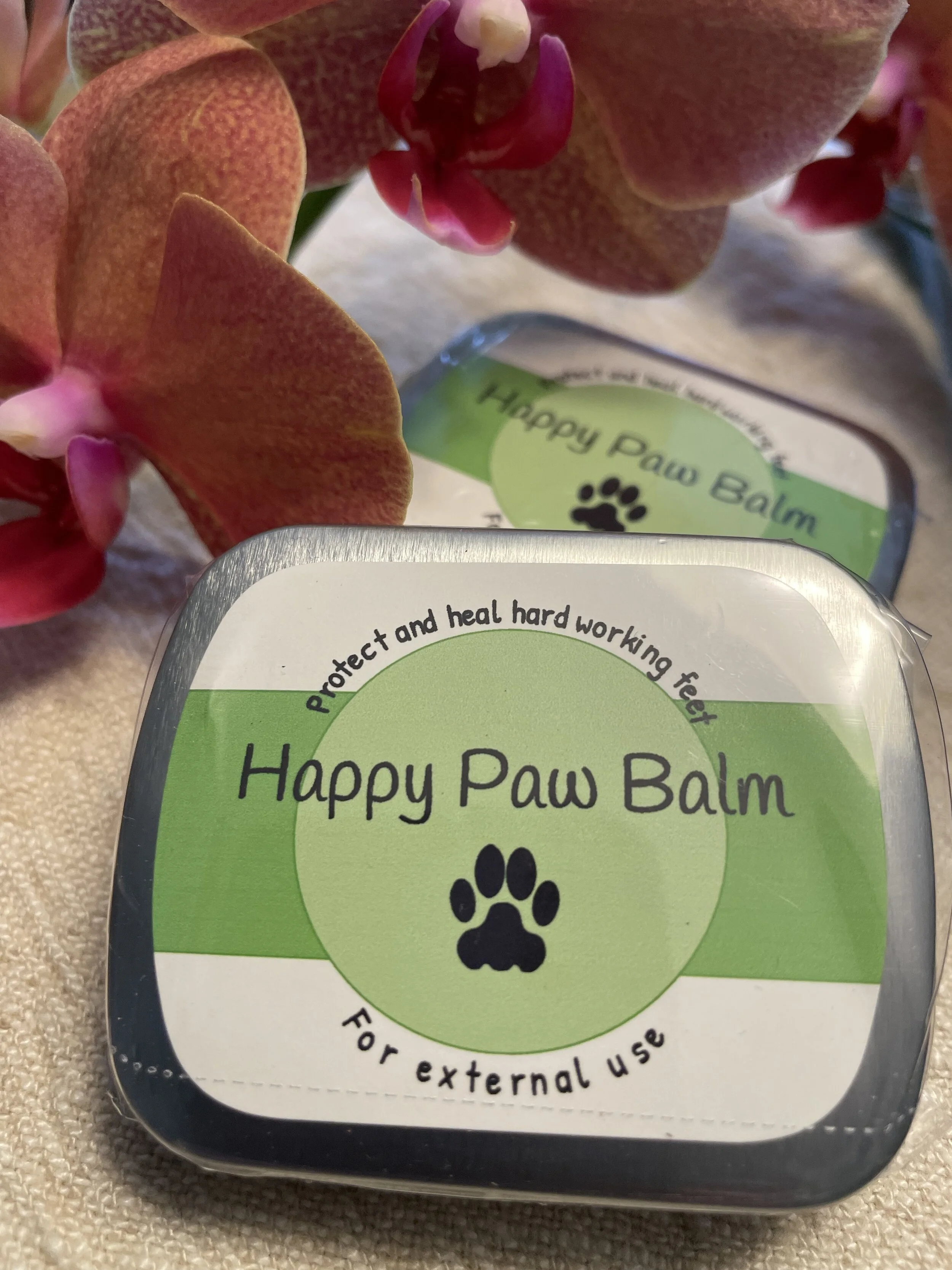 Happy Paw Balm - especially made for your pups hard working feet, helpful year round to protect and heal your pups paws.