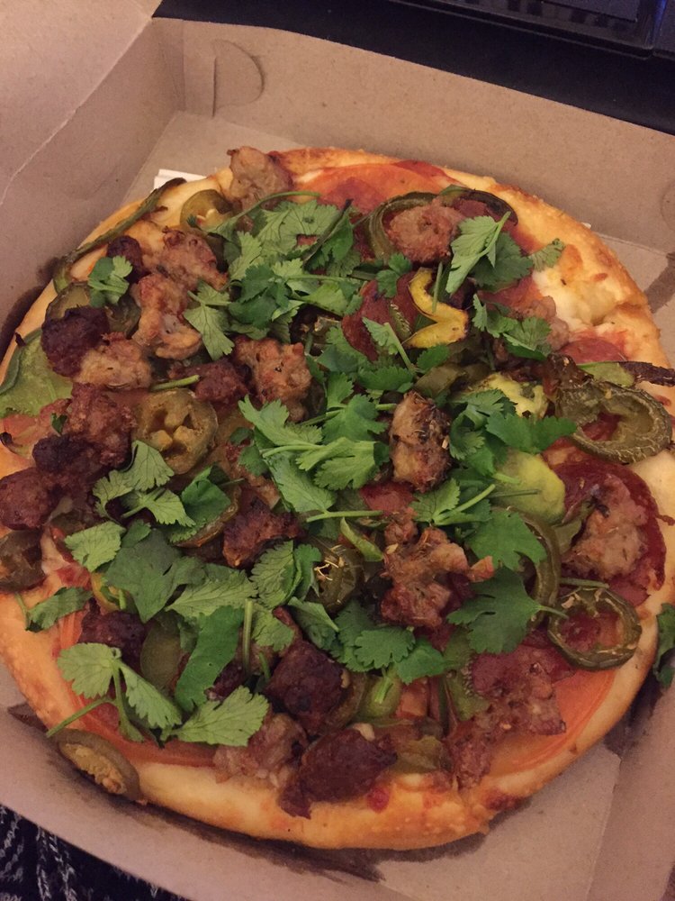 Mexican Pizza with chorizo, italian sausage, tomato slices, and cilantro..jpg
