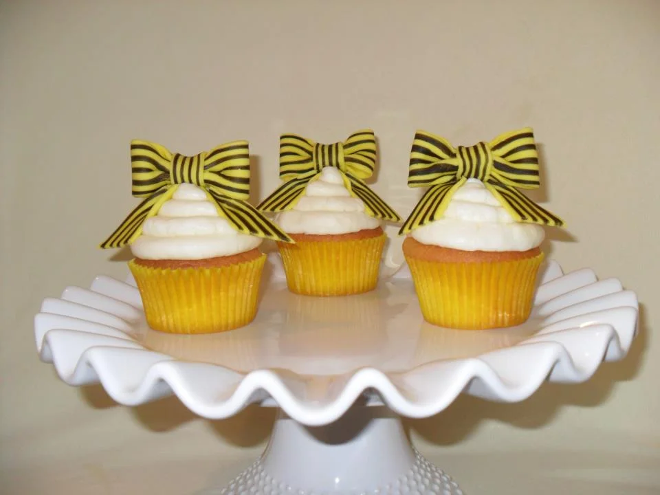 yellow and black bow cupcakes.jpg