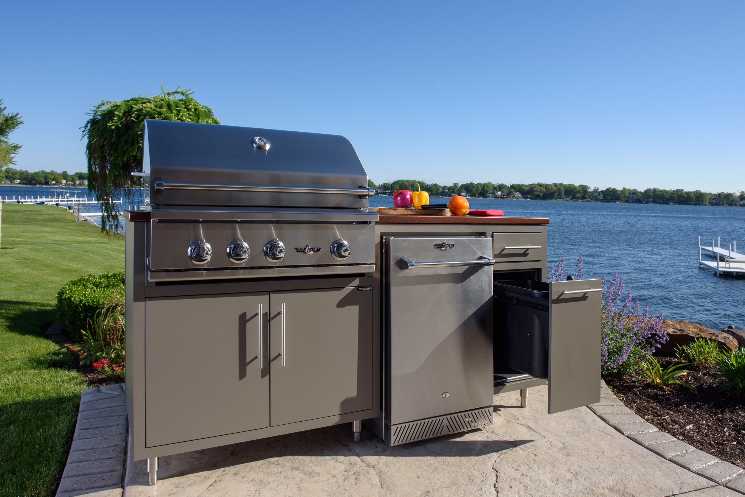ONLY $5,567! Model 17COGI-72 is 72" wide (30" deep) and includes a Delta Heat 32" Grill (LP or NG), a 20" Delta Heat outdoor refrigerator, 18" Trash drawer (can NI), a single drawer and double door cabinet. (With Infrared Rotisserie $5,741. With Rotisserie and Sear Zone $5,857) Color pictured is Grey Glimmer with Silver Vein counter-top. Also available (in stock) in Cappuccino with Copper Vein counter-top!