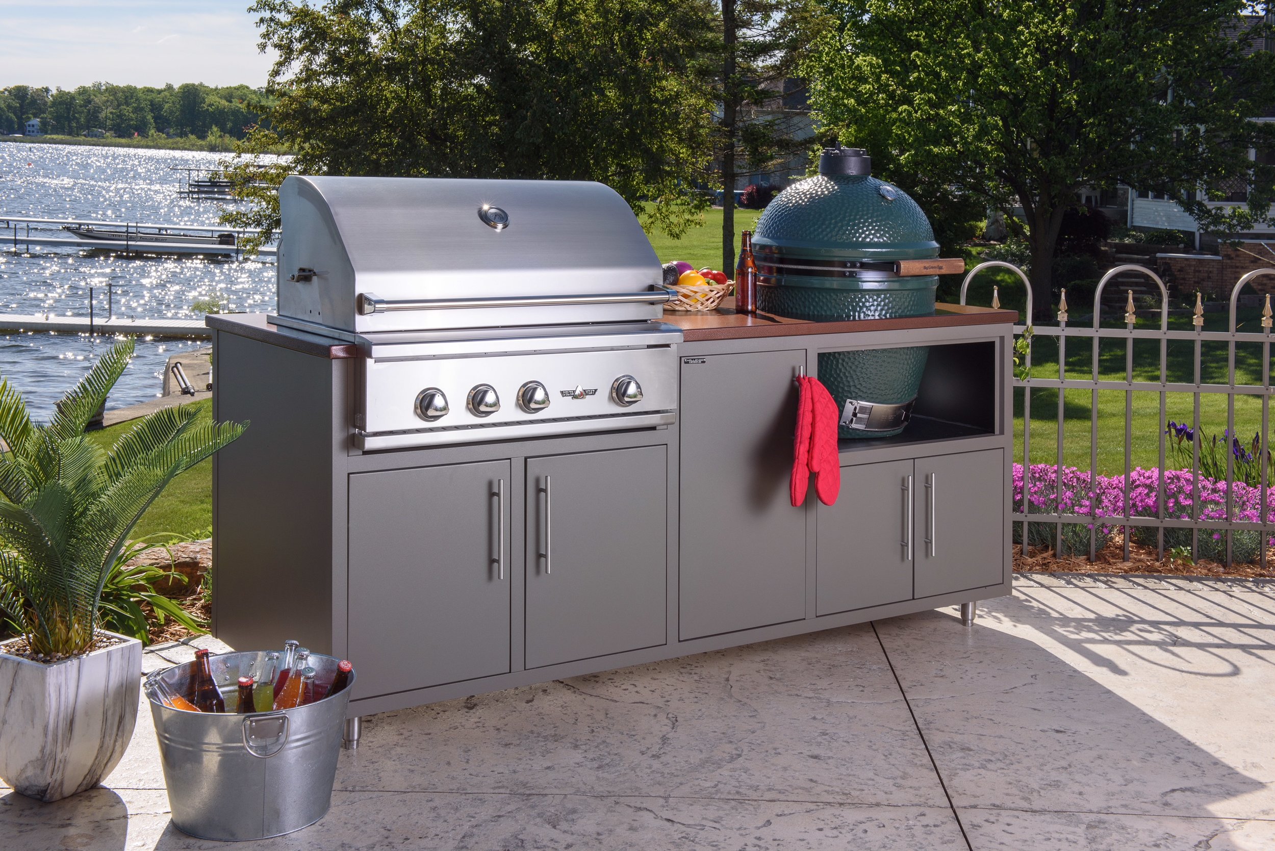 ONLY $5,836! Model 17COGI-82 is 82" wide (30" deep) and includes a Delta Heat 32" Grill (LP or NG), a 30" Large Green Egg, two double door cabinet, and a tall single door cabinet. (With Infrared Rotisserie $6,010. With Rotisserie and Sear Zone $6,126) Color pictured is Grey Glimmer with Silver Vein counter-top. Also available (in stock) in Cappuccino with Copper Vein counter-top!