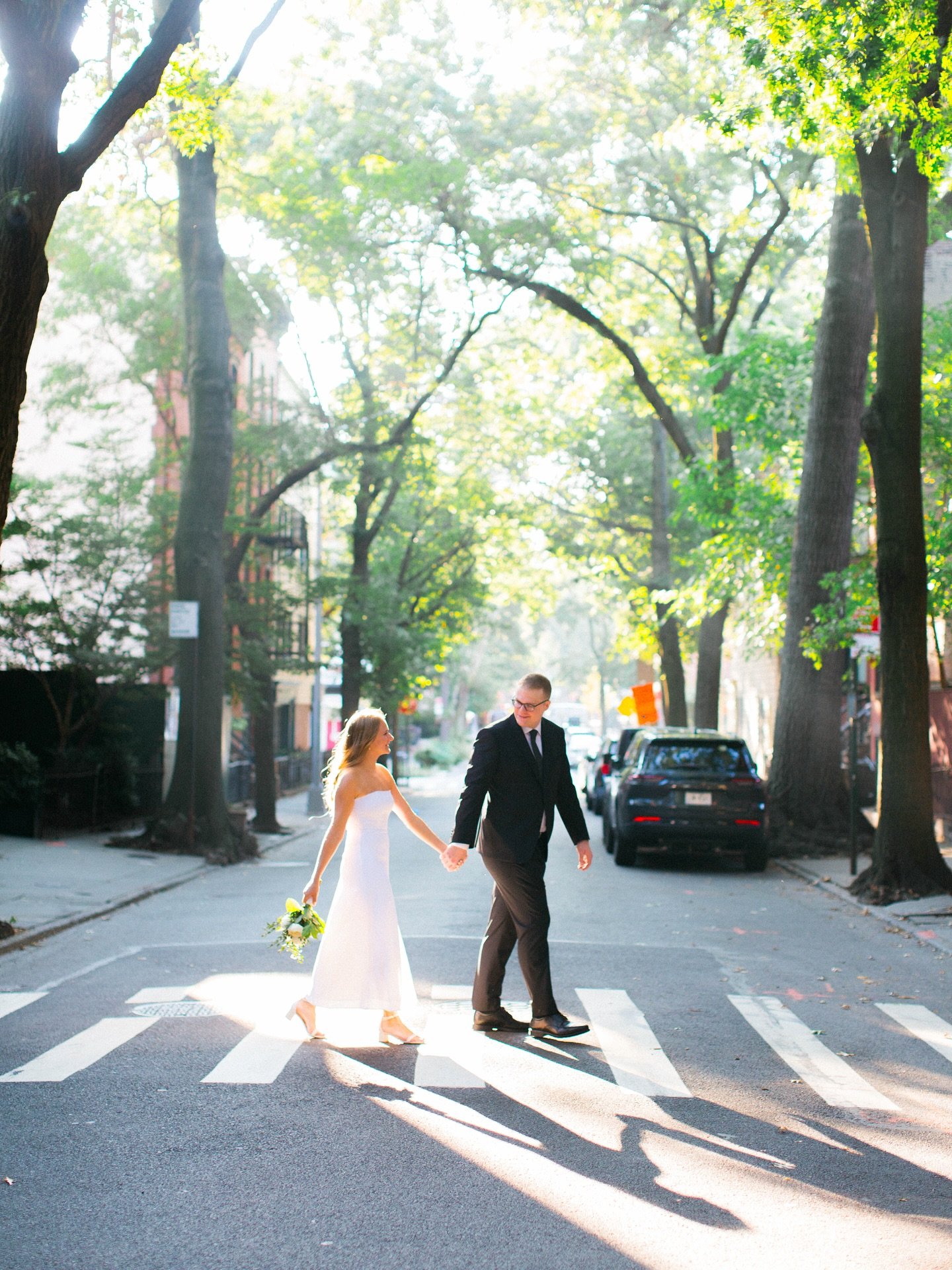 Judy &amp; Ross eloped in NYC last month and it was EVERYTHING and more! The morning felt like the end of your favorite romantic movie - a montage of joyful scenes scattered across the city. My cheeks hurt from smiling so much  that day - I just fell