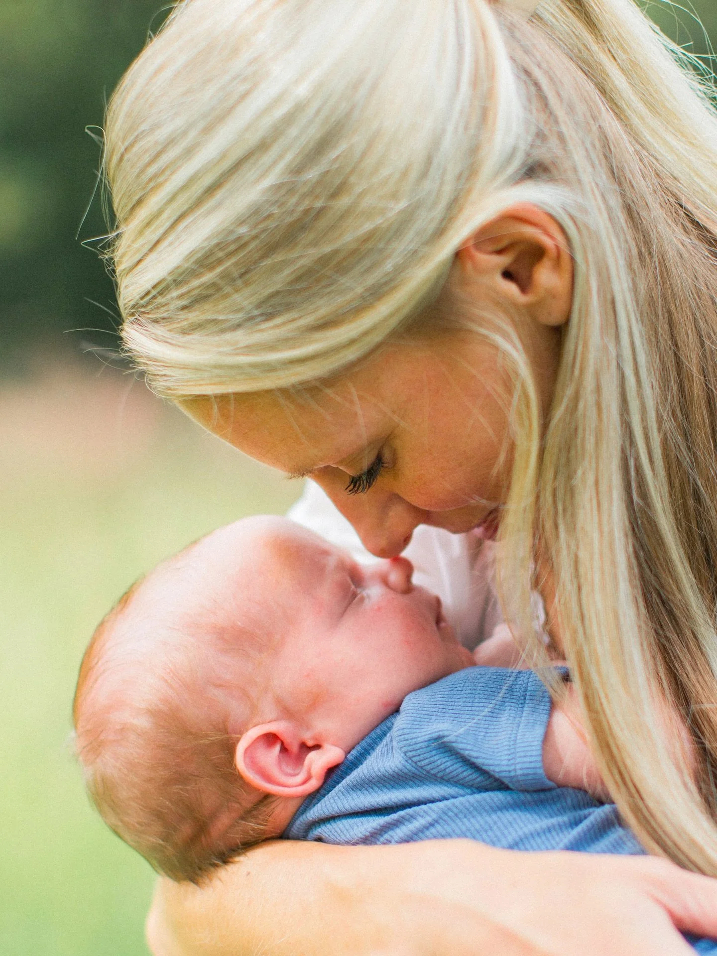 Every day this little guy is doted on by three loving older brothers. I love that we captured a rare quiet moment for this beautiful mama. In the midst of it all &mdash; a moment that&rsquo;s just theirs.