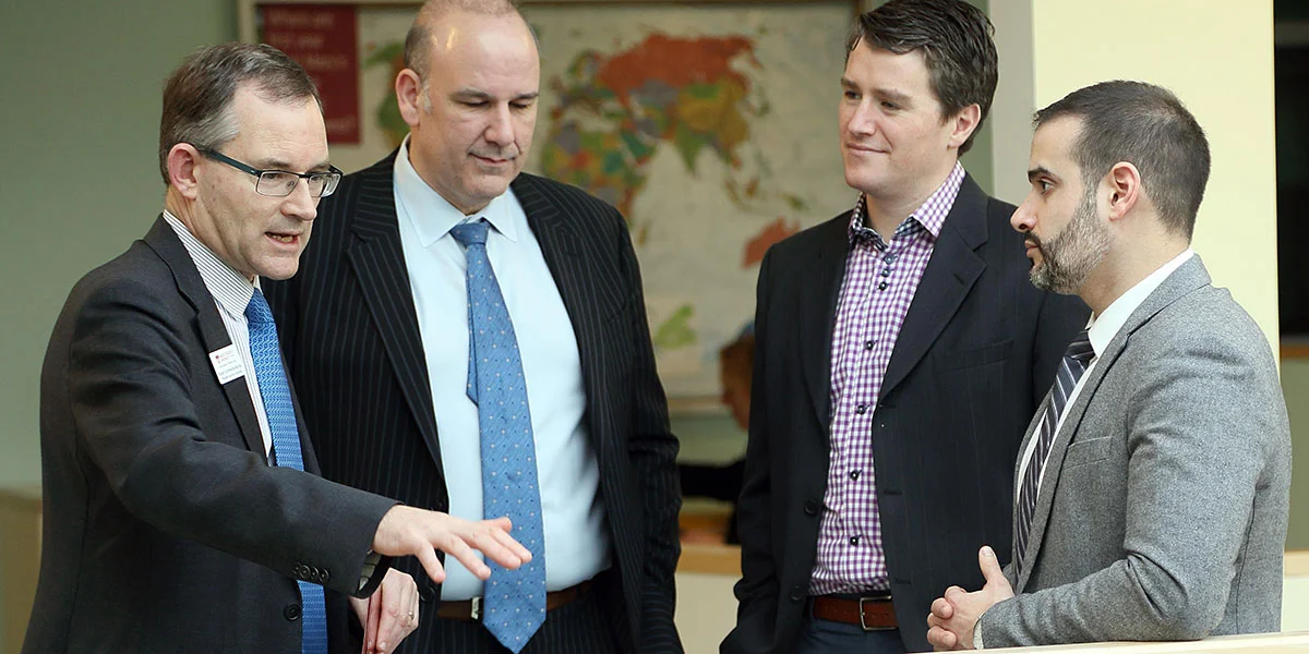 Robert Summerby Murray, President of Saint Mary's gives a tour of the Atrium to Labi Kousoulis, Nova Scotia Minister of Labour and Advanced Education; Richard Brown, Prince Edward Island Minister of Communities, Land and Environment; and Zach Churchill, Nova Scotia Minister of Education and Early Childhood Development