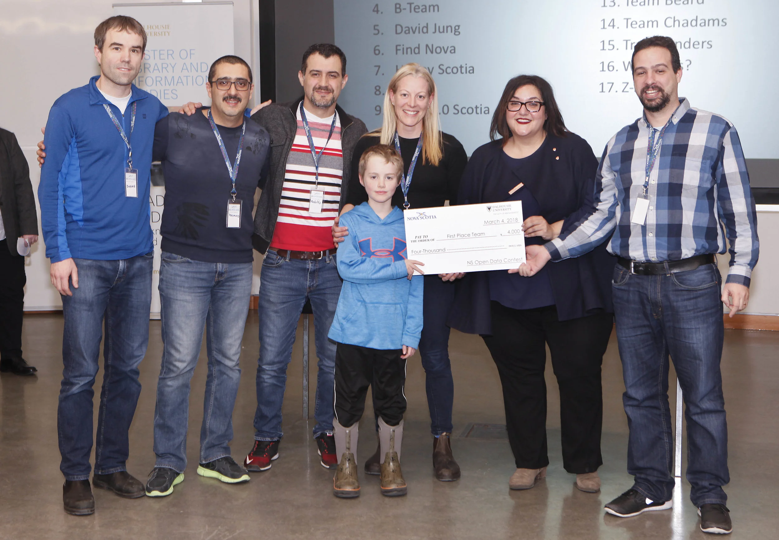 Saint Mary's "Bridge to NS" top prize winning team with Internal Services Minister Patricia Arab. 
