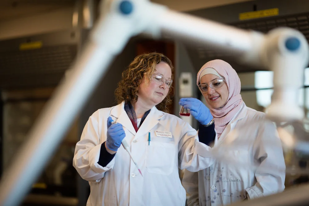 Saint Mary’s professor Dr. Christa Brosseau (left)