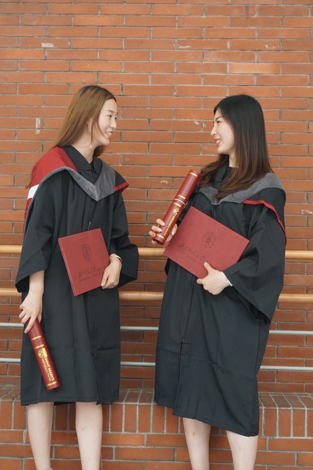   Zou Tiantian (left) plans to continue her postgraduate studies at Johns Hopkins University in September. Han Qi (right) will travel to Italy to begin a master’s program at Bocconi University this fall. 47 of the 63 graduates will pursue postgraduat