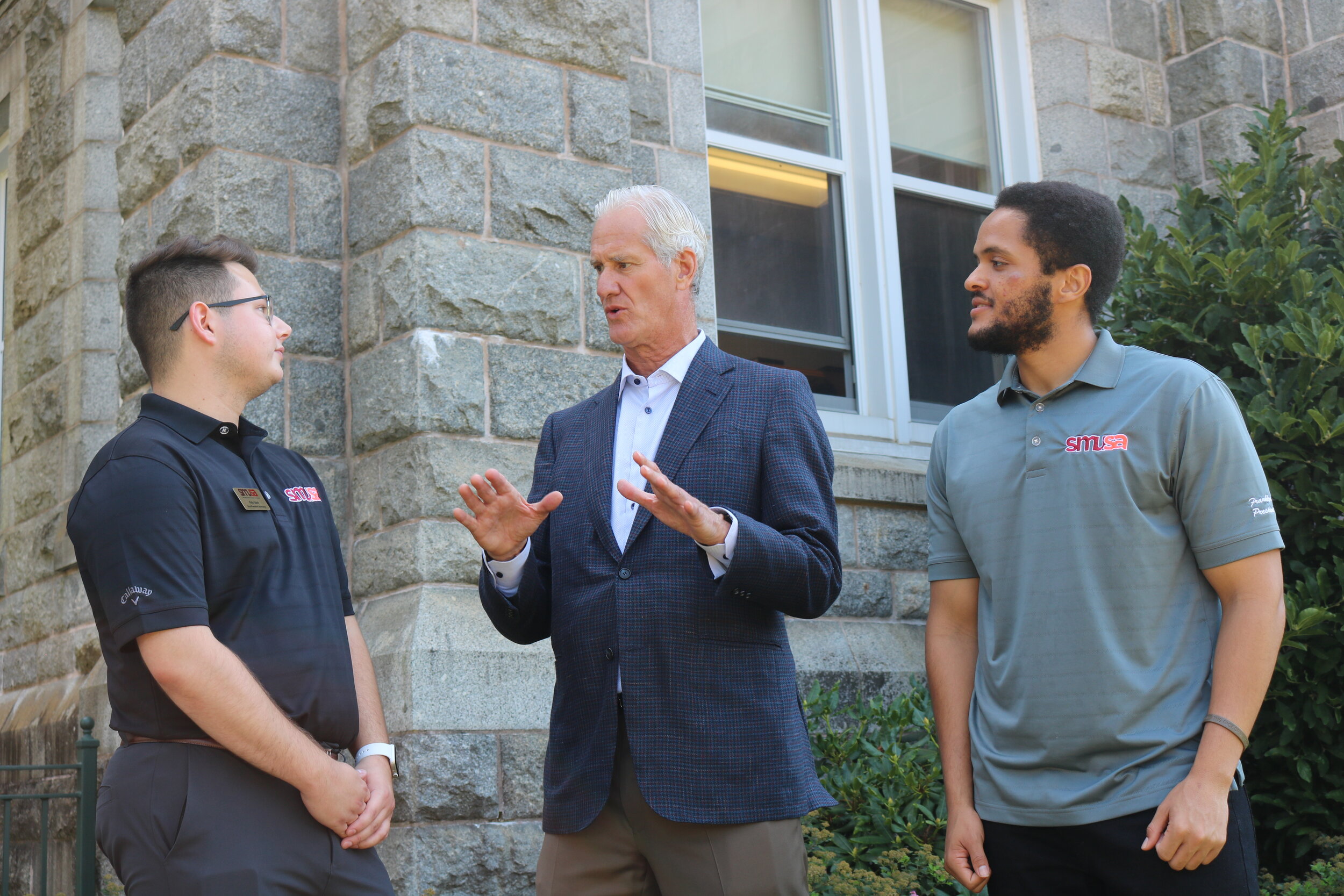 Scott chatting with SMUSA VP Advocacy Kyle Cook and SMUSA President and CEO Franklyn Southwell
