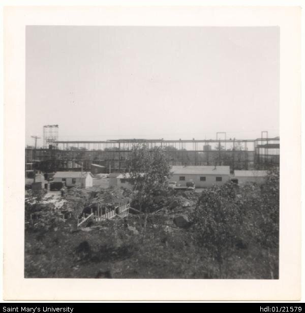  Photograph of the construction of McNally Building in its bare beginnings, looking west 