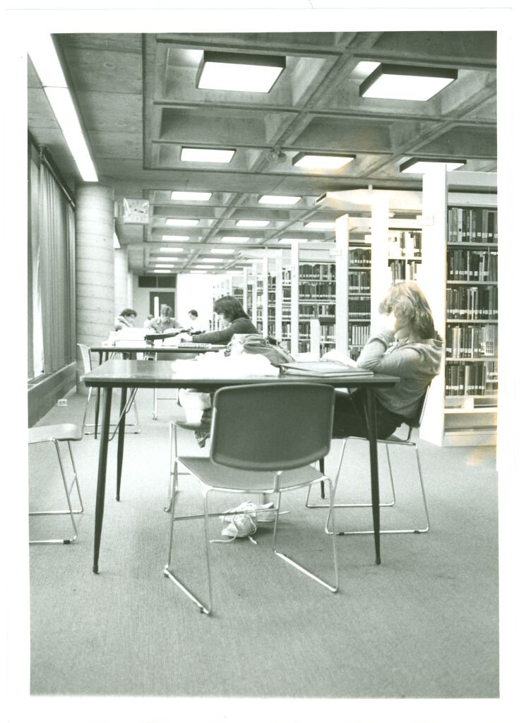  Photograph of the second or third floor, with students working at tables. 