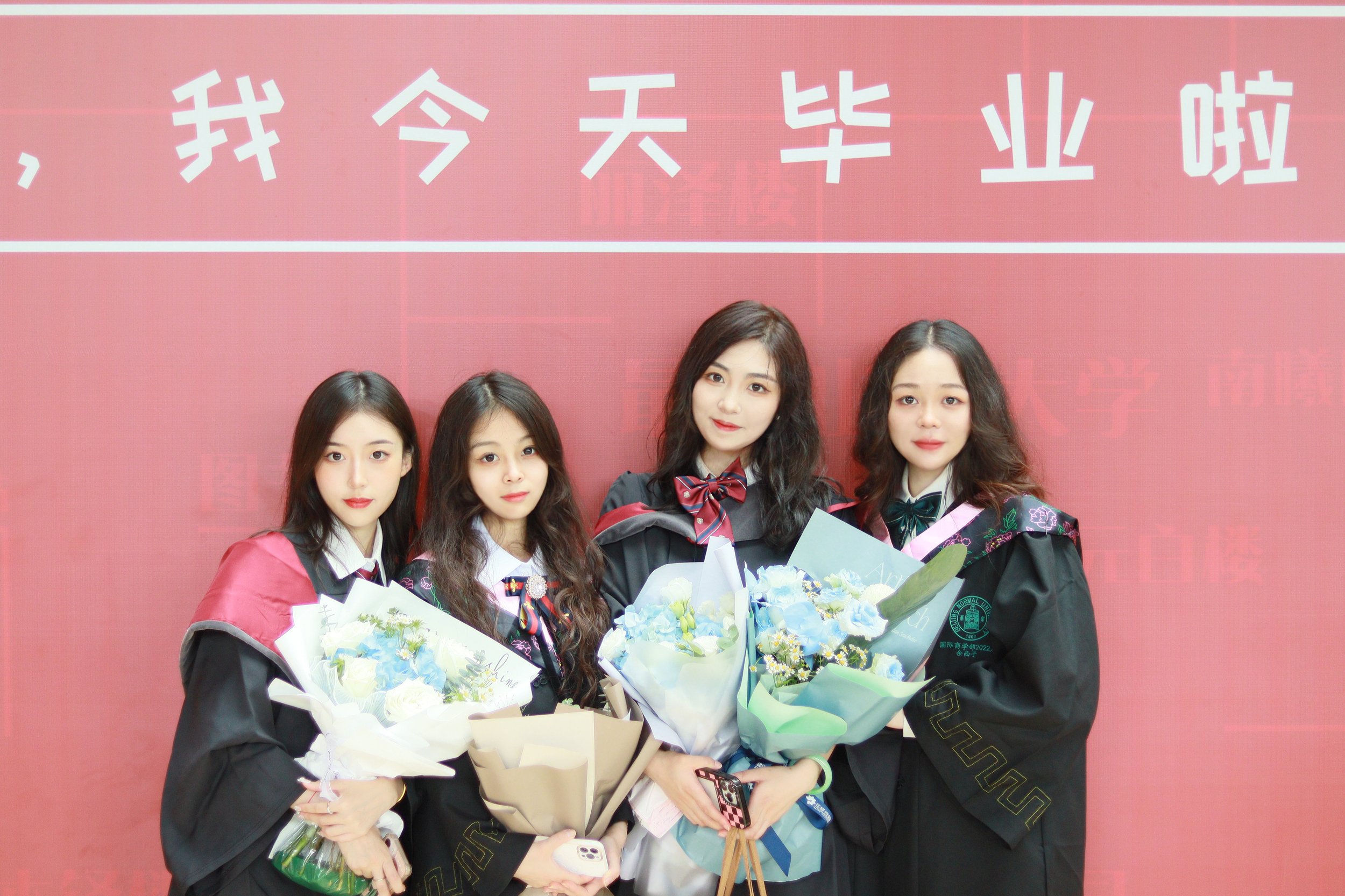  A group of friends celebrate their successful completion of the BNUZ-SMU Joint BComm Program at Beijing Normal University, Zhuhai. From left: Liu Xinran, Liu Jiaqi, Shi Jingyi and Yu Xizi.  