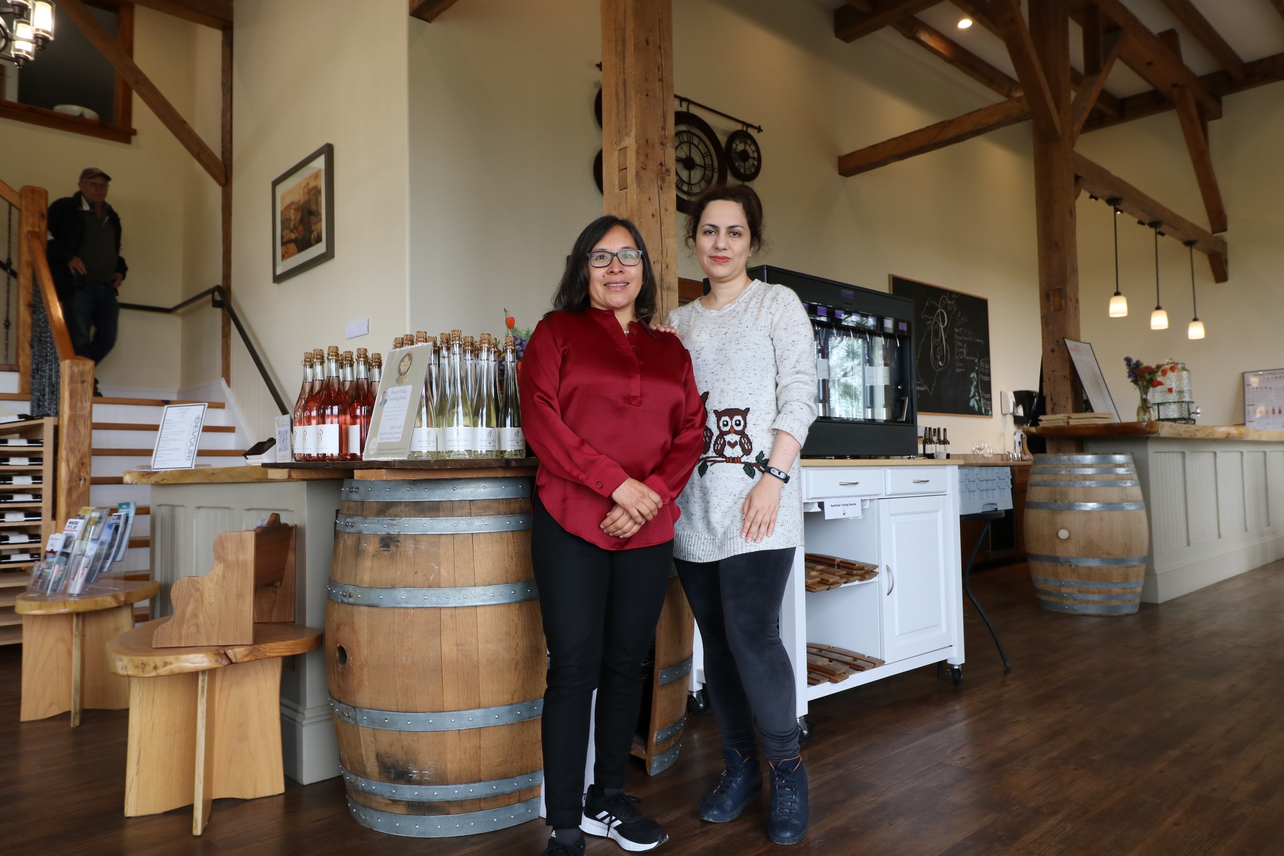  De Fuentes and Seyedjafarrangraz stand inside the winery 