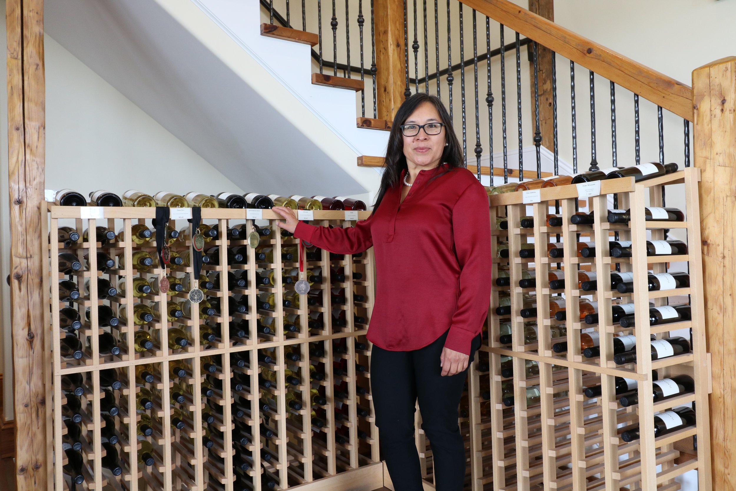  De Fuentes standing with a selection of NS wines 