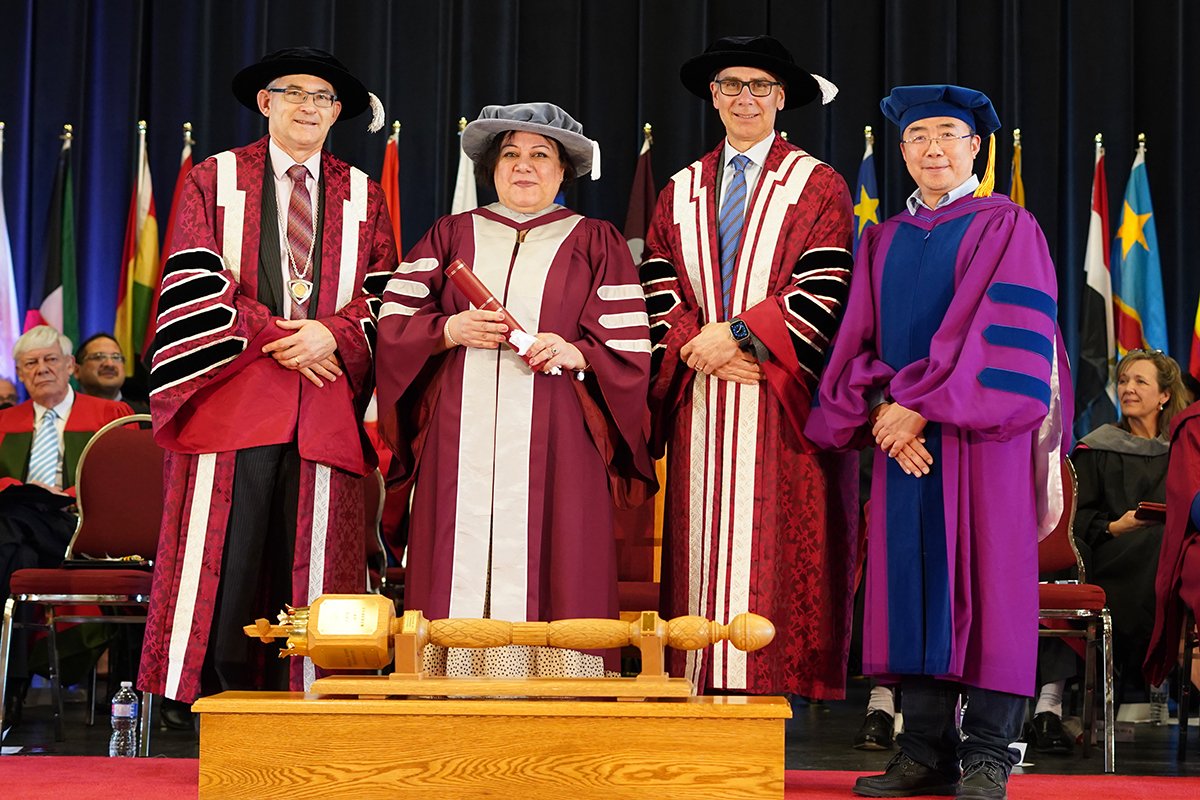  Dr. Zainab Almukthar with President Summerby-Murray, Chancellor Durland and supervisor Michael Zhang 