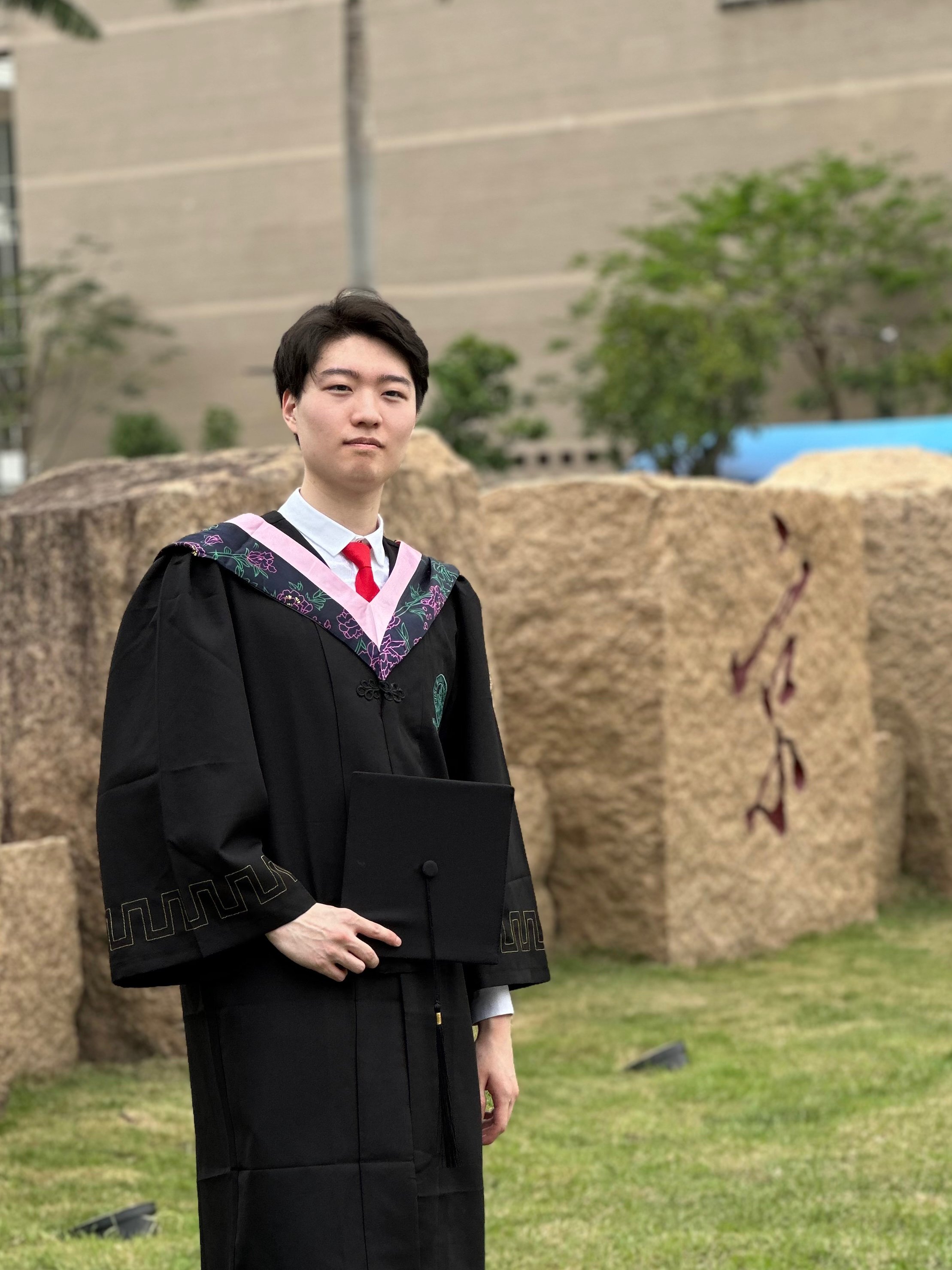  Zhang Jinyang, seen here with the BNUZ graduation gown and cap, graduated cum laude and will soon head to the Netherlands to pursue his postgraduate studies at Utrecht University. 