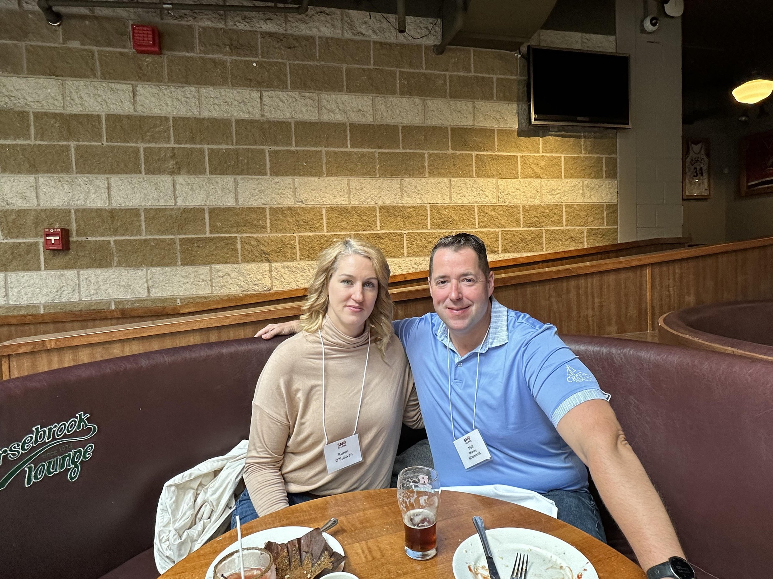  Two alumni at Homecoming Brunch in celebration of the classes of 1998 and 2013 