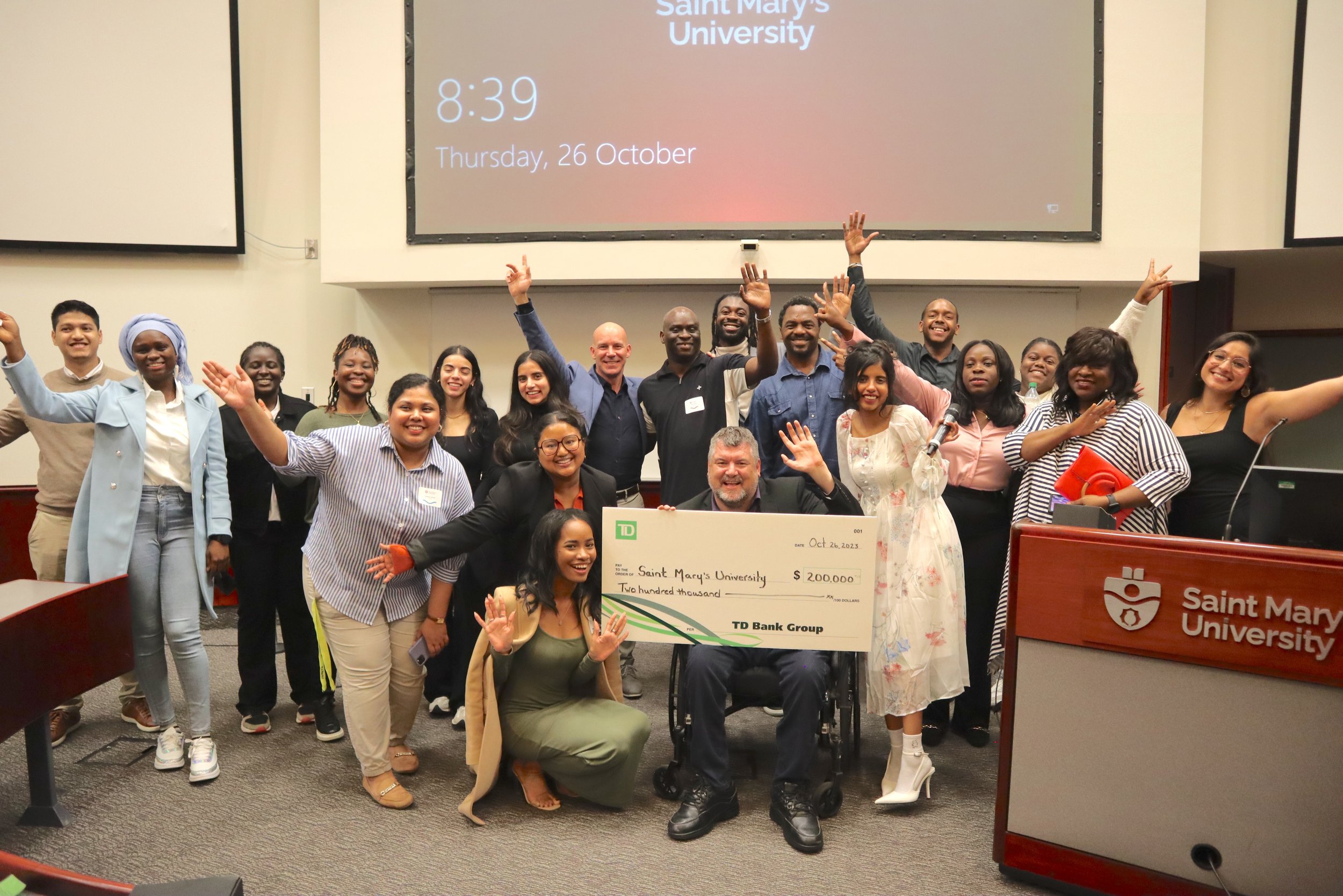  Participants celebrating the first Diversity Equity Inclusion &amp; Belonging (DEIB) event and the generous gift by TD Bank Group 