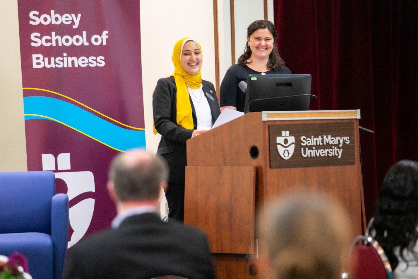  Co-Chairs of the Women in Business Committee and hosts of the “Sobey School of Business - Elevating Women in Business: Blazing Trails”, Manar Salem and Meredith Drost, welcoming our panelists and speakers. 