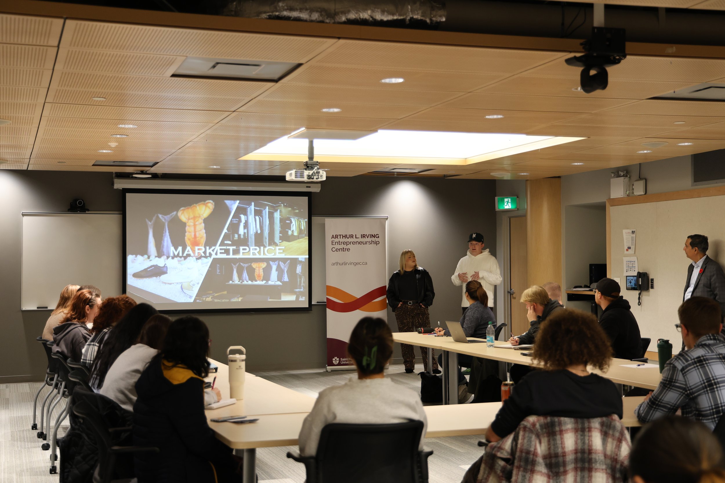 Matthew Smith BComm’18 and Lauren Ferguson BComm’20 kicking off the event with their presentations 