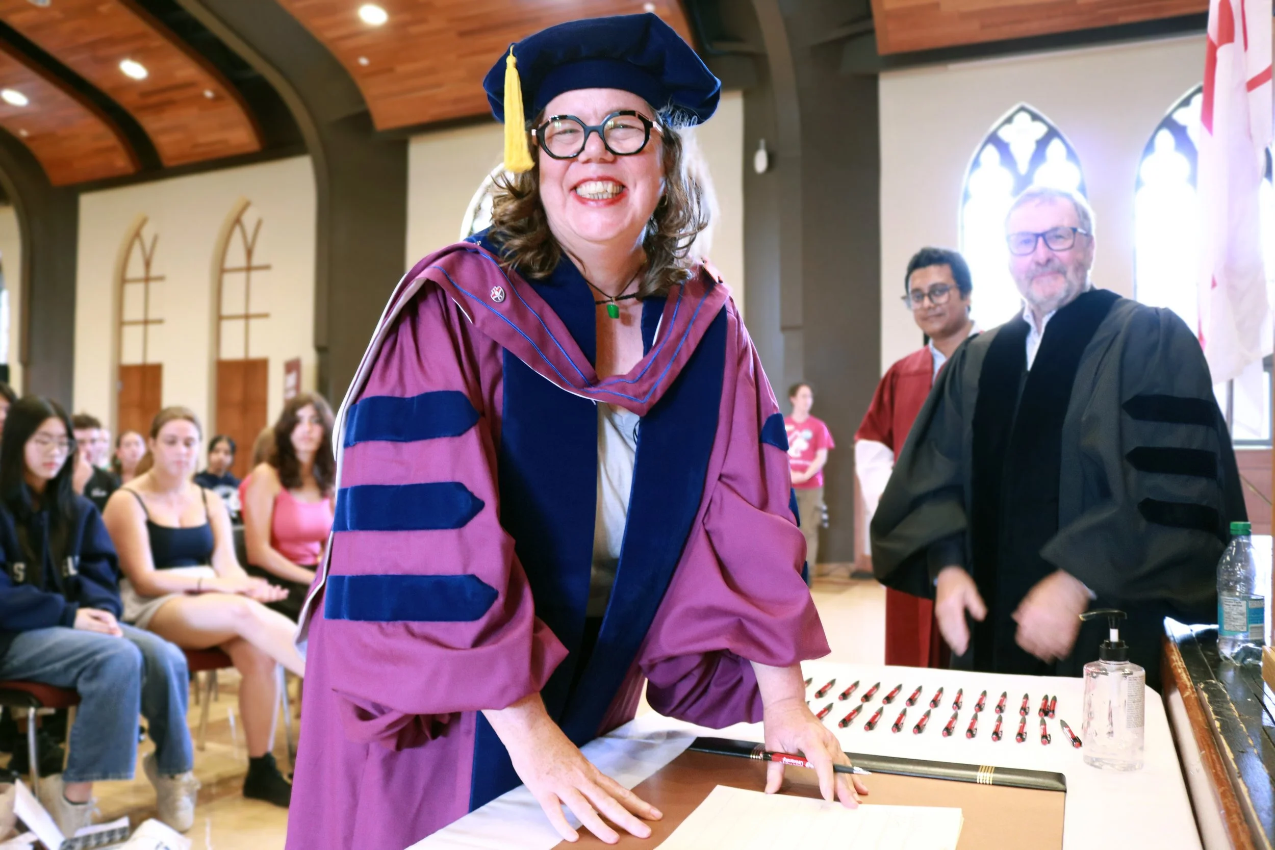 Dr. Dea signs the university register