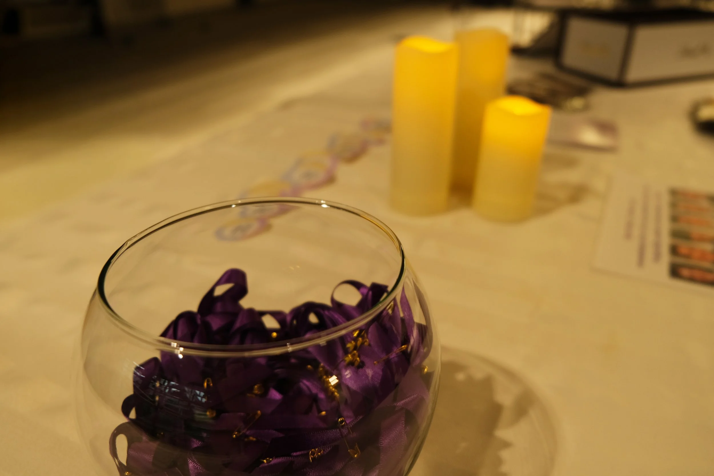  Purple ribbons are worn in honour of victims of gender-based violence 