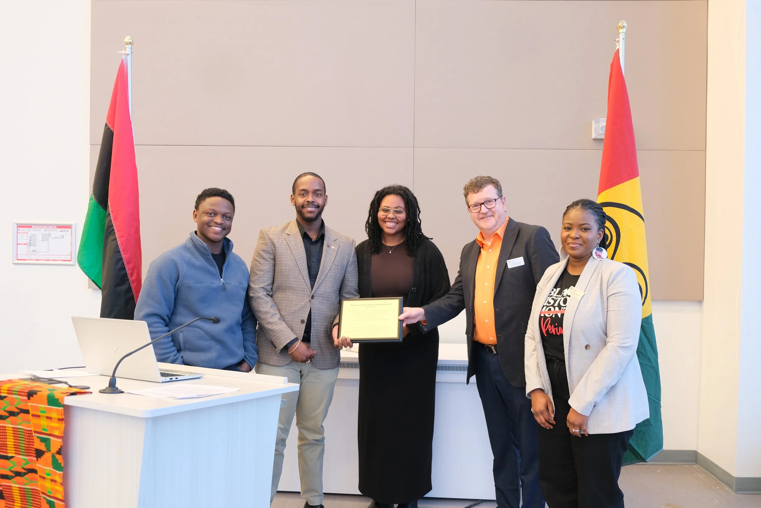  Student leaders Simbarashe Chiunda, Ramon Stultz and Jaiden Kariuki-MacDonald with Tom Brophy, Associate Vice-President, Student Aﬀairs and Services and Ebun Oladele, Black Student Advisor at the naming ceremony 