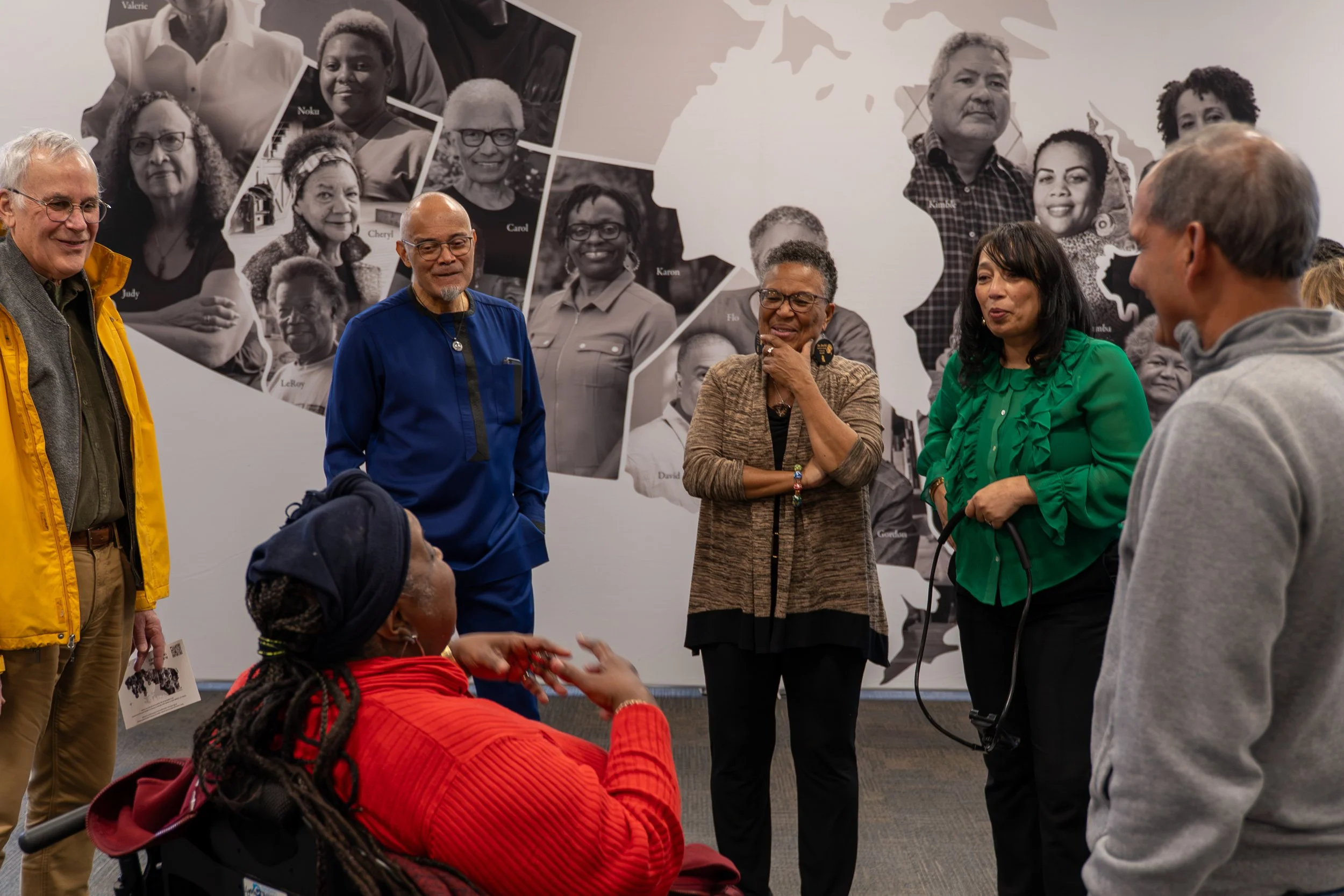  Artists discuss the exhibit with Dr. Lynn Jones and attendees 
