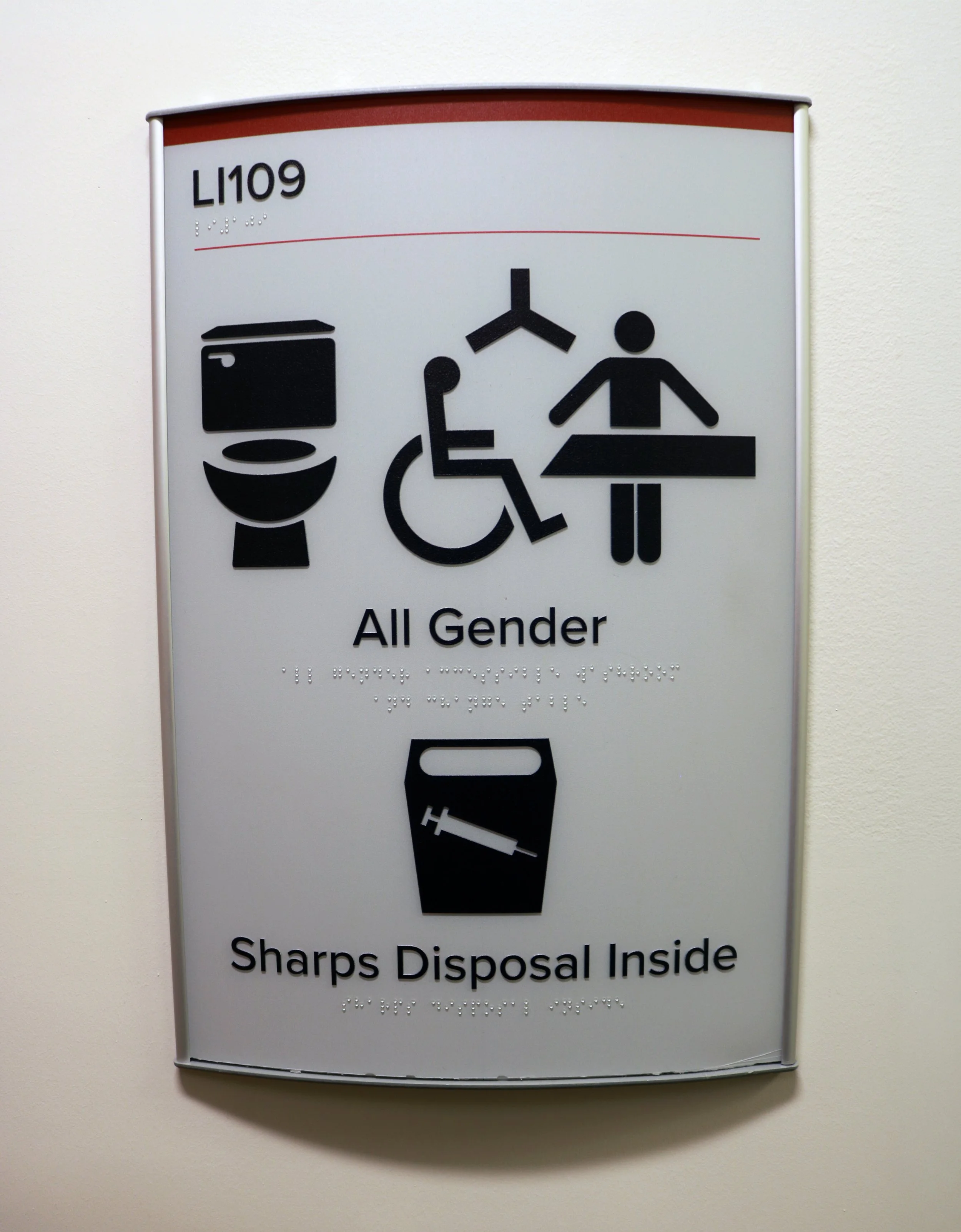  Signage indicates accessibility features of the washroom 