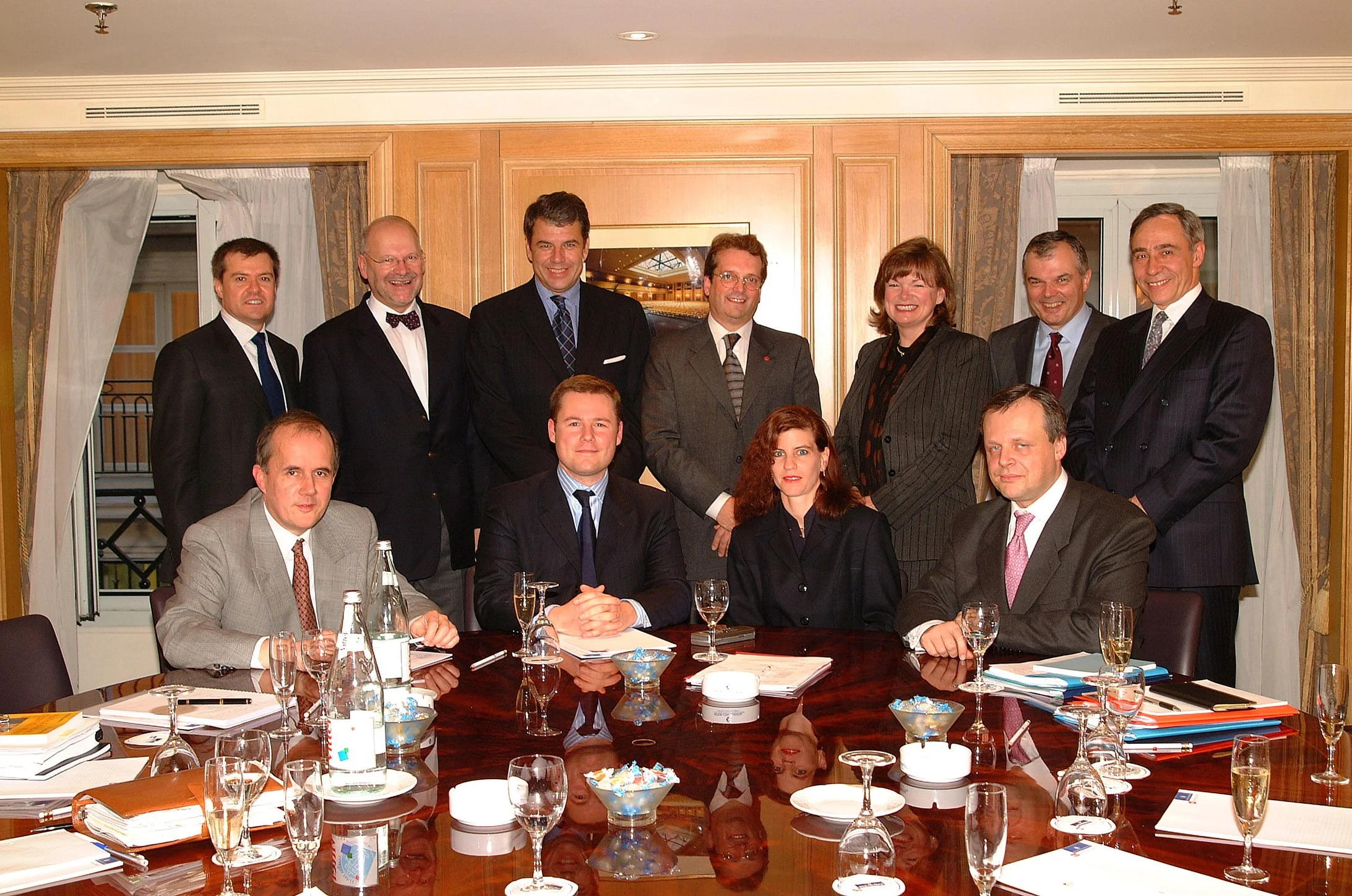  William and members of his team signing a partnership with La Poste in Paris 