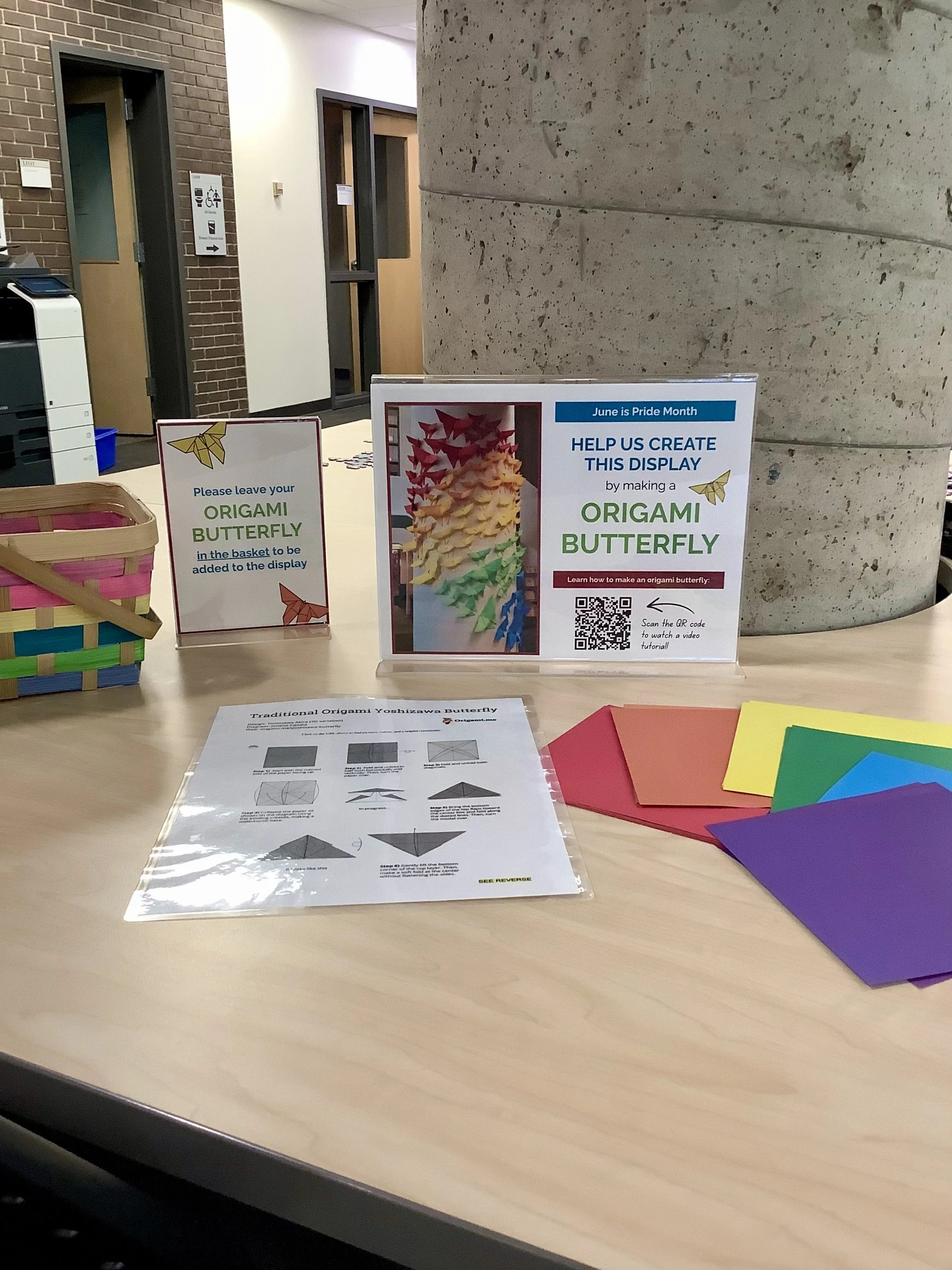 Activity table with origami butterfly supplies