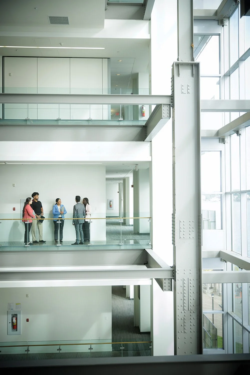 Students being toured around a large industrial building