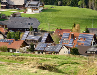 InsideClimate News /Osha Gray Davidson Solar panels cover the rooftops of a German farming village.
