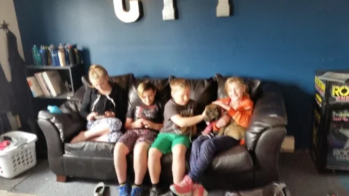 Angel visits with some of the kids at the local gym.