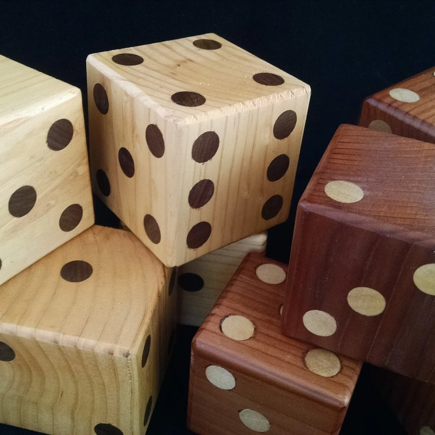 Yard dice with inlaid wood